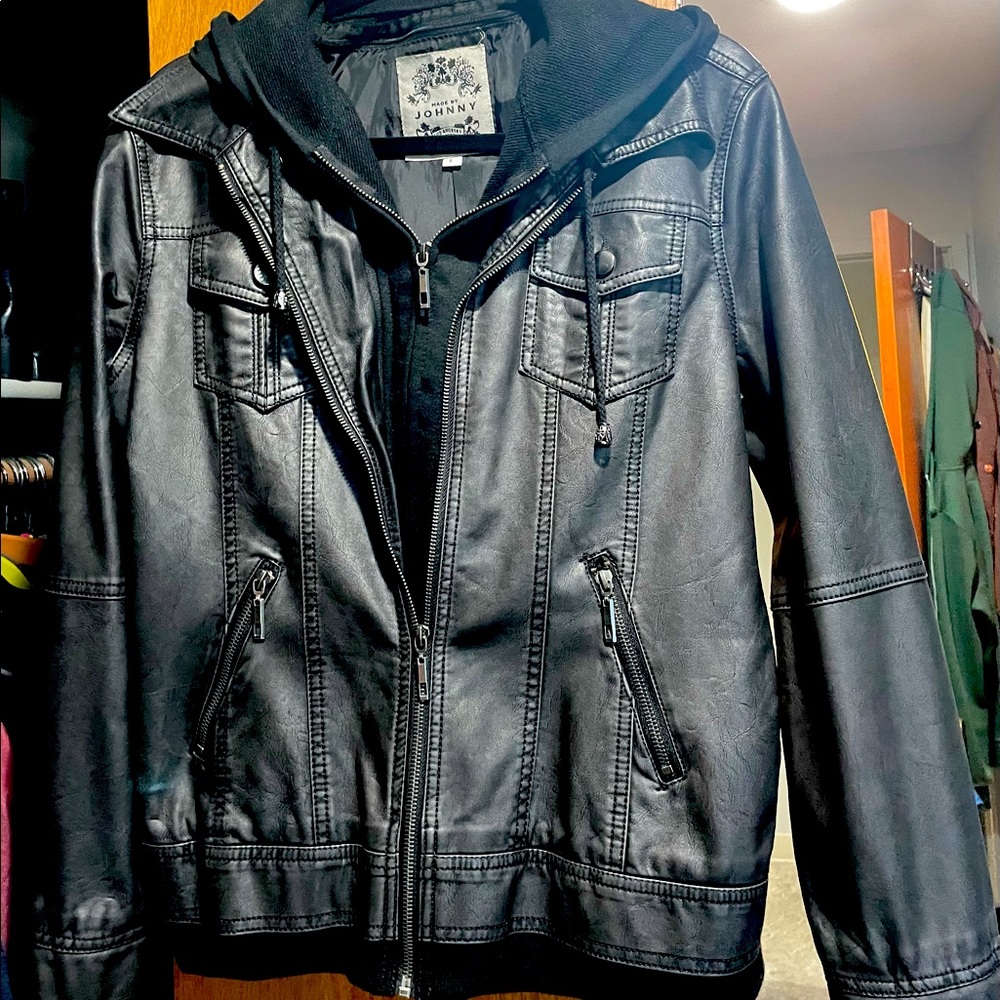 Vegan black jacket with detachable hood.
